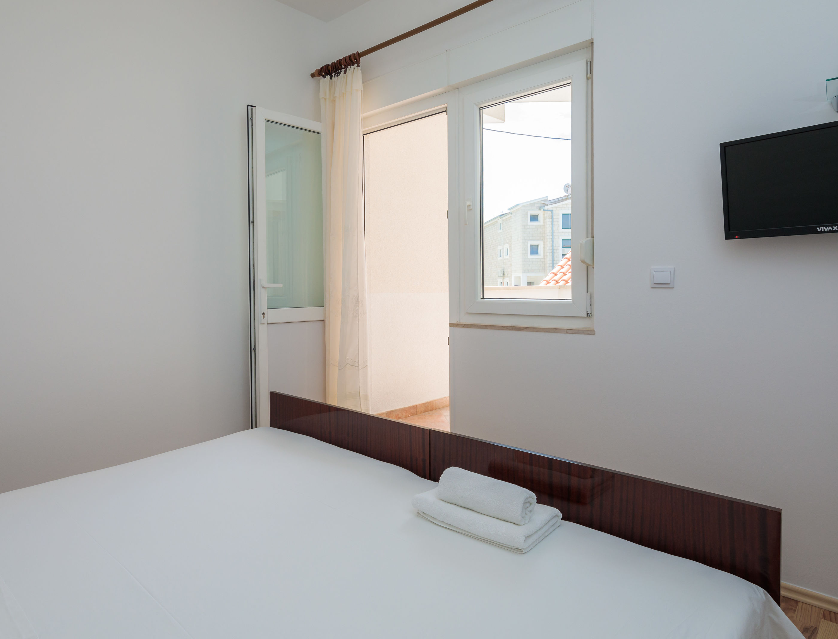 Apartments and Rooms Denis 56551-A1