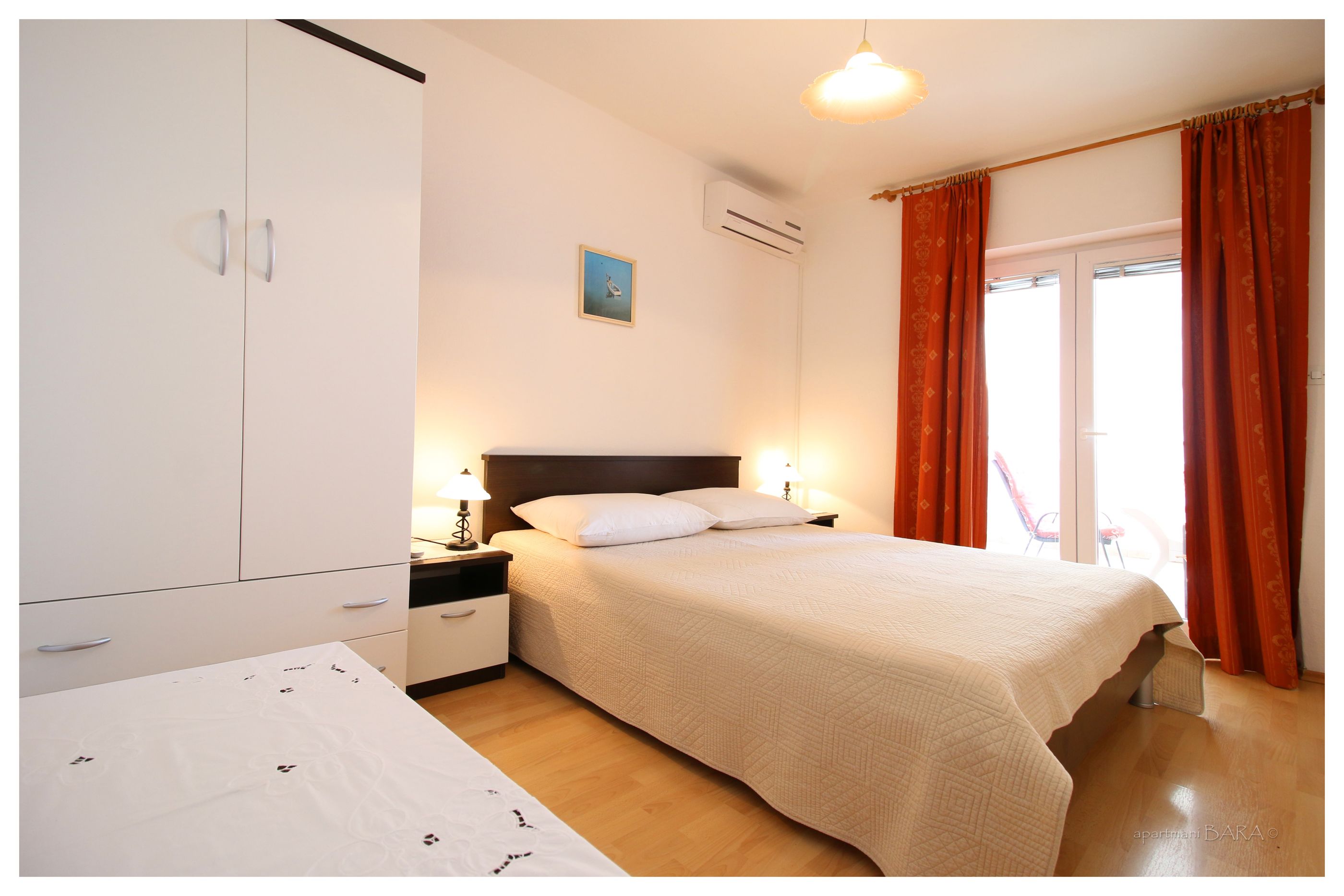 Apartments and Room Janja 50381-A2