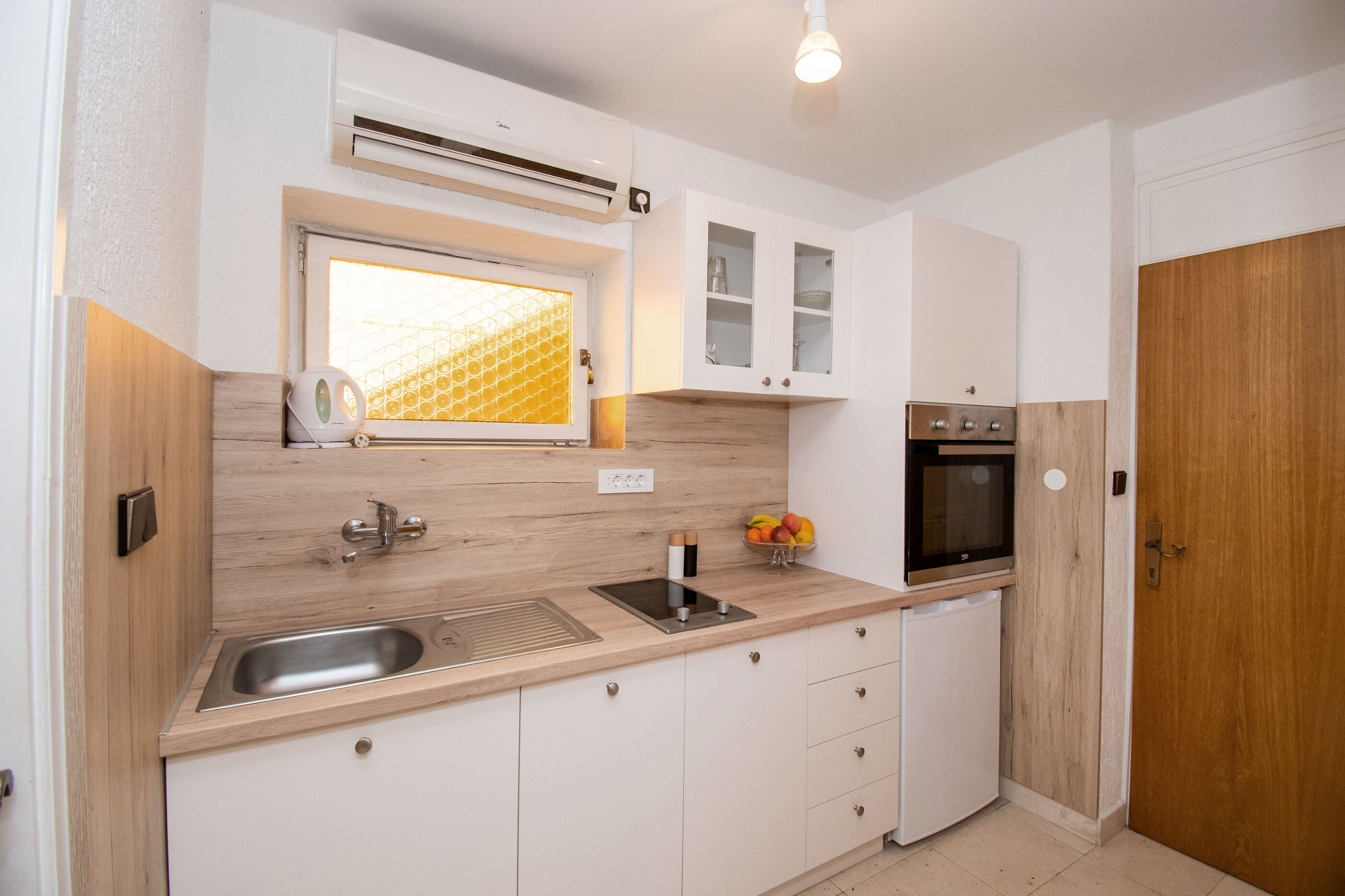 Apartments and Room Agiss with pool 83371-A2