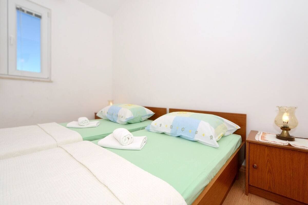Apartments Sima 104011-A1